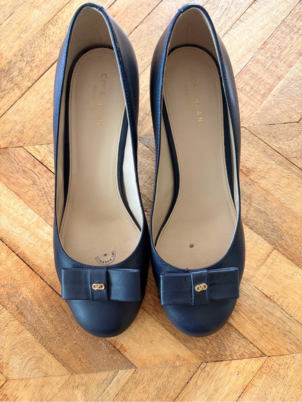 Cole Haan Navy Leather Bow Toe Pumps with Gold Accent